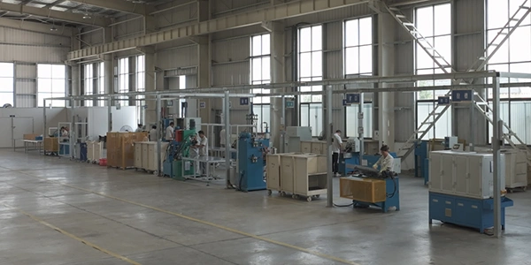 Taller de producción de resortes de gas